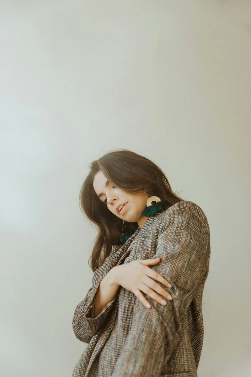 Woman in gray knit sweater